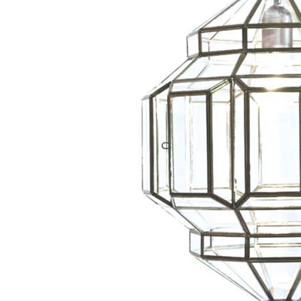 These glass lanterns are made in a generations-old workshop in Granada, Spain. Each pendant light is hand forged, and reflects the influence of Moorish design that can be observed throughout the region.

These lanterns, with their multitude of