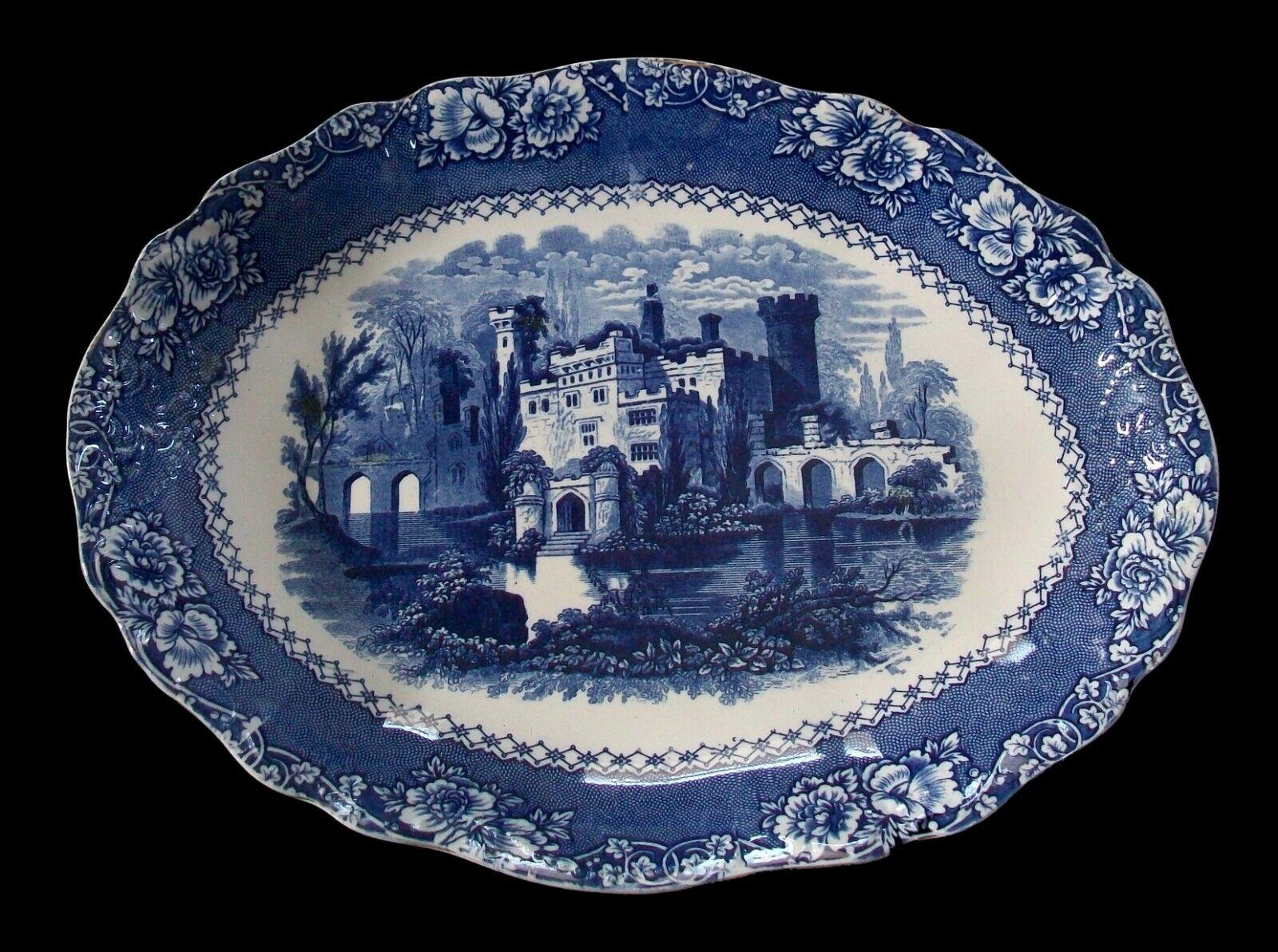 ALHAMBRA (Pattern Name) - Victorian Staffordshire blue transfer decorated ironstone platter or tray - featuring a castle in the center with a floral pattern border - raised/embossed handle grips to each end - high gloss glaze over-all - pattern name