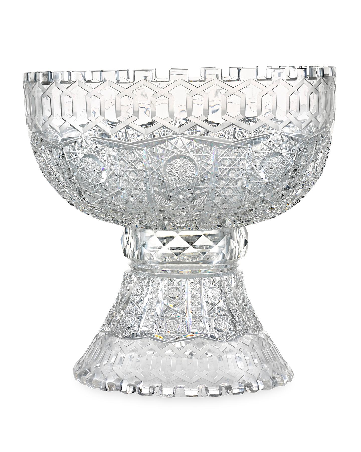 This strikingly beautiful and rare American Brilliant Period cut-glass punch bowl set comes replete with eight cups to sip from and a matching serving ladle. Crafted in the scarce and hotly sought-after Alhambra pattern, this opulent cut-glass