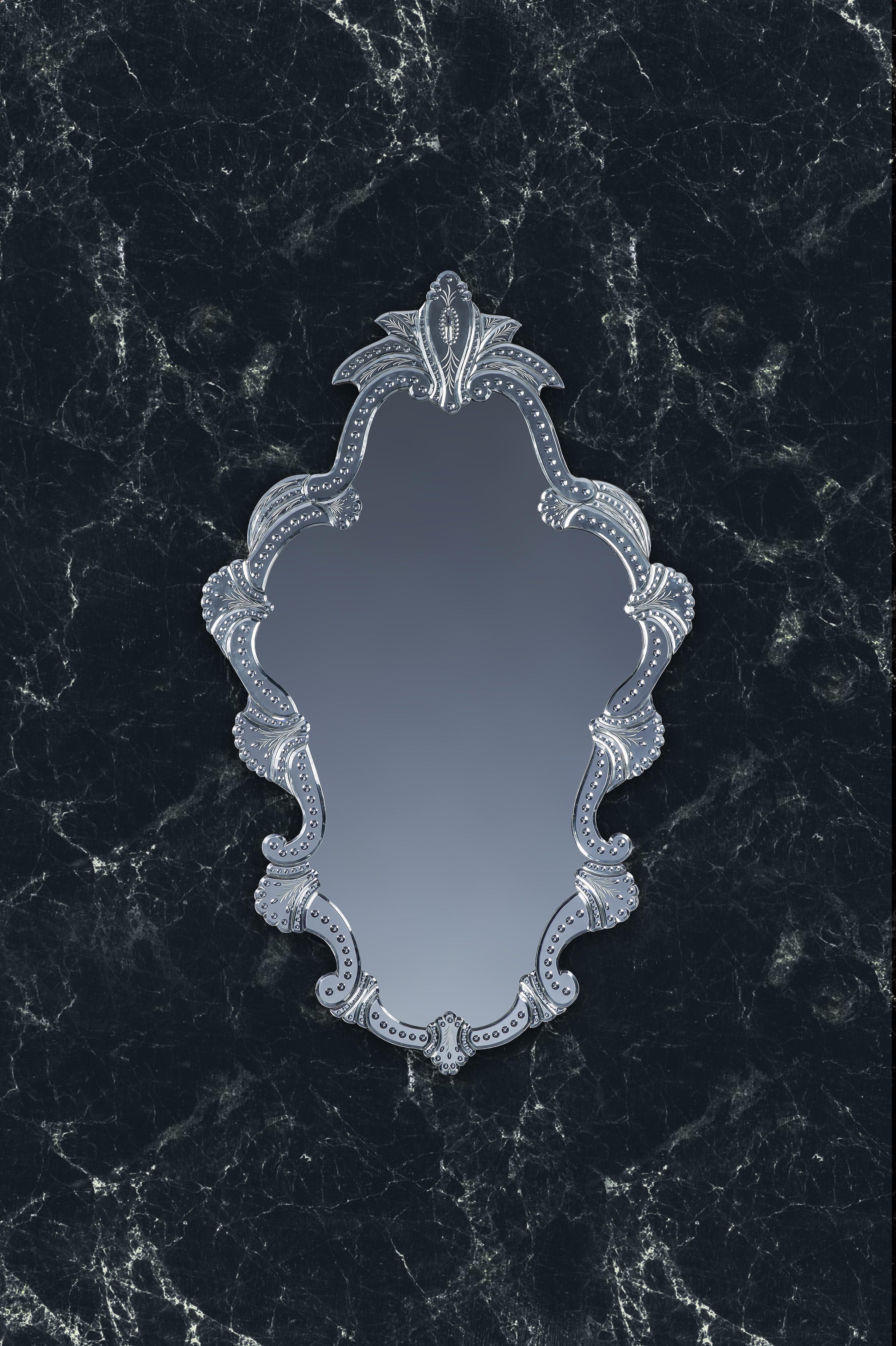 Luxurious mirror in Murano glass, in 19th century French style, made by the Tosi Brothers on the island of Murano, all bevelled, engraved. Carved and polished entirely by hand, the silvering in pure silver is still performed today following the