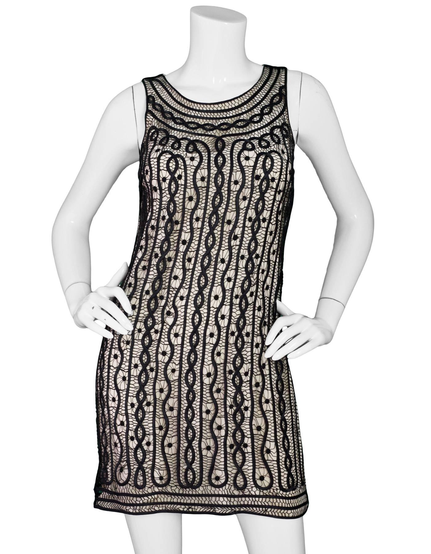 black lace dress with beige underlay