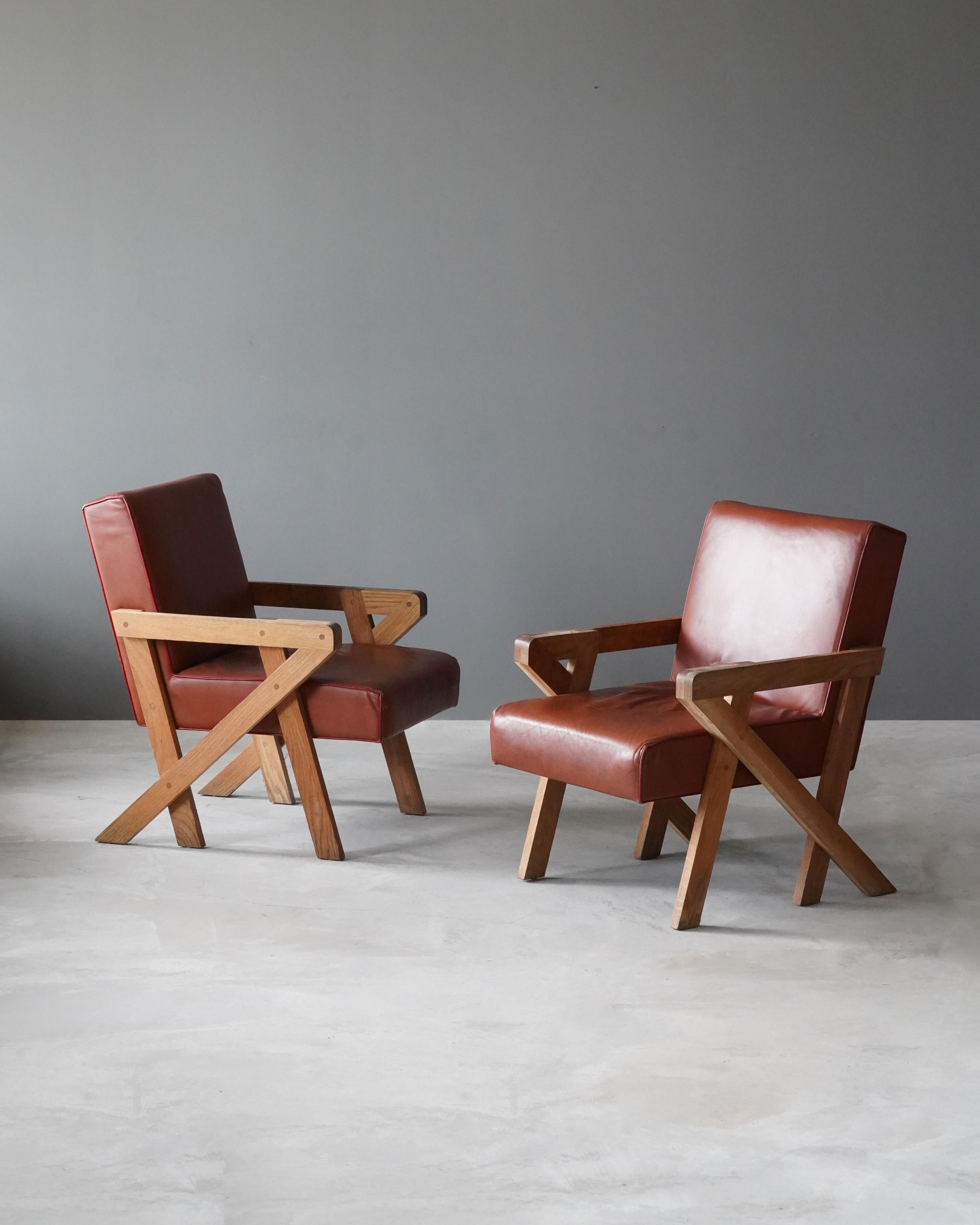 A pair of site specific armchairs chairs from a restaurant named Pop Pub in New York. Designed and produced by Turkish-American designer Ali Tayar in 2011.

Solid oak and featuring it's original leather.