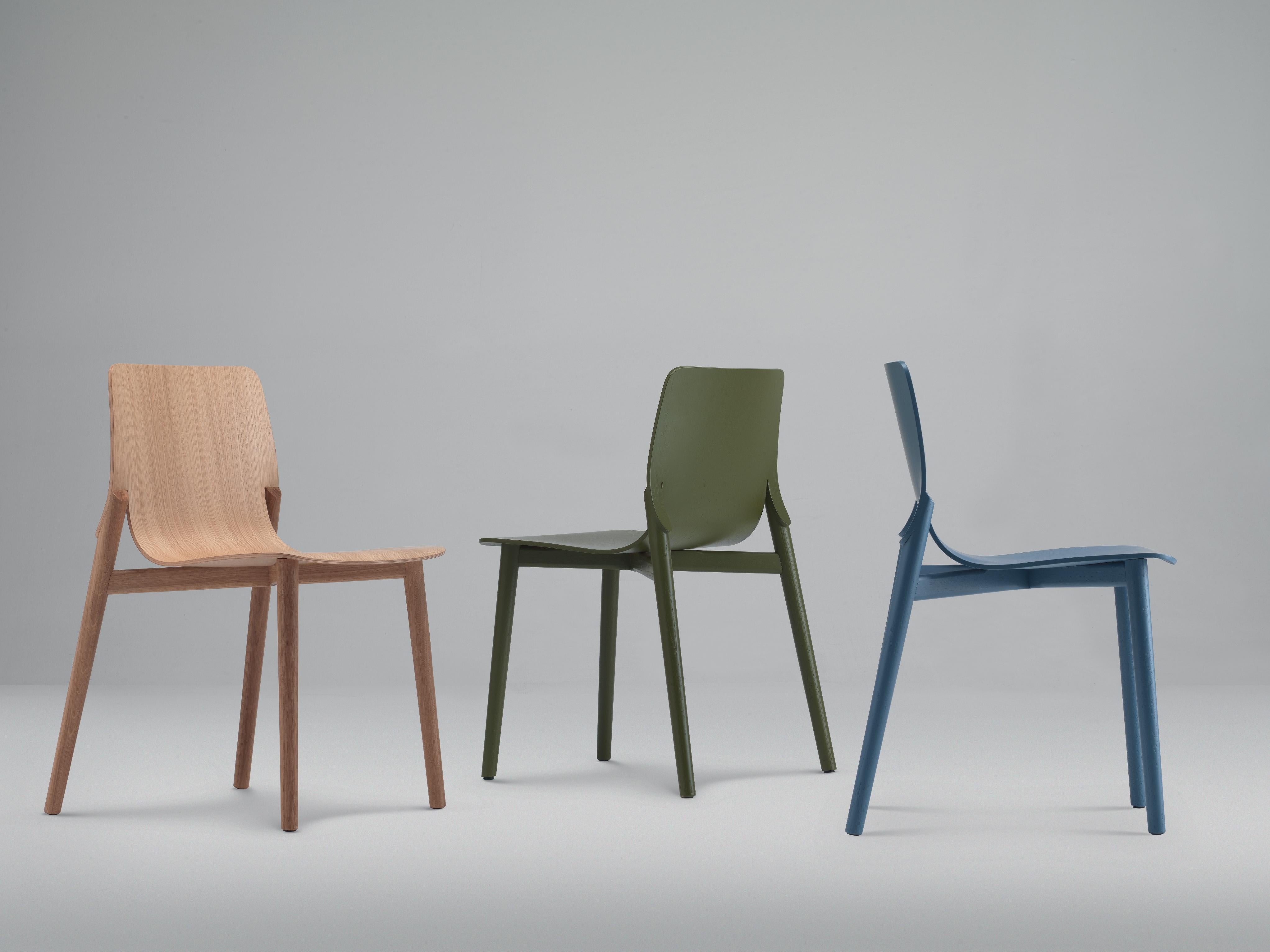 Alias 047 Kayak Chair in Black Oak Stained Seat and Frame by Patrick Norguet

Chair with solid oak or beech structure and Seat in curved oak or beech veneered plywood. Finishes: transparent varnish, walnut, dark oak, or coloured stains. On