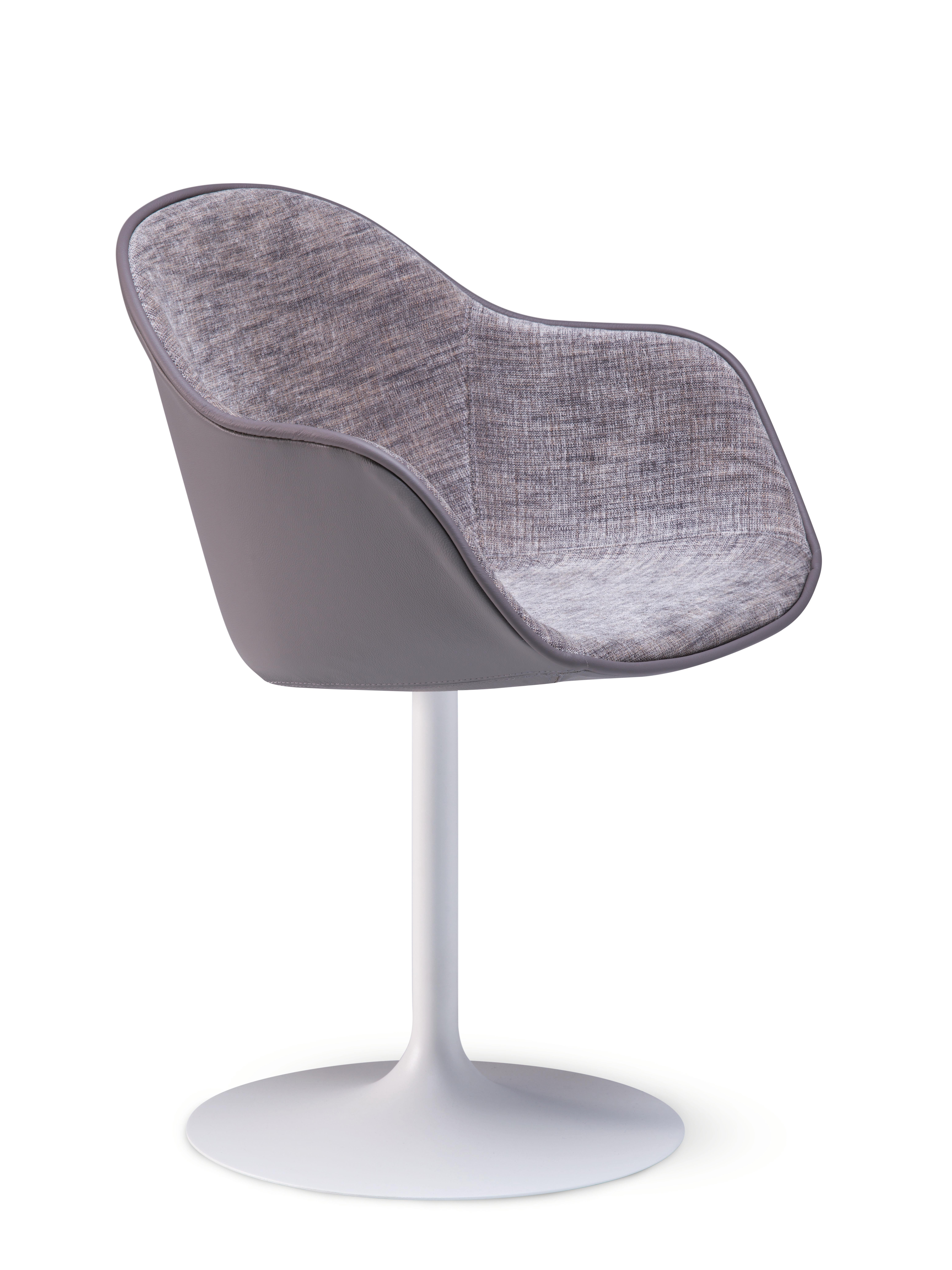 Alias 07G New Lady Soft Calyx Chair with Upholstery Seat & White Lacquered Steel Frame by Paolo Rizzatto

Chair with swivel base in lacquered steel. Shell in polyurethane covered with fabric or leather (cover is not removable). NOTE: it is