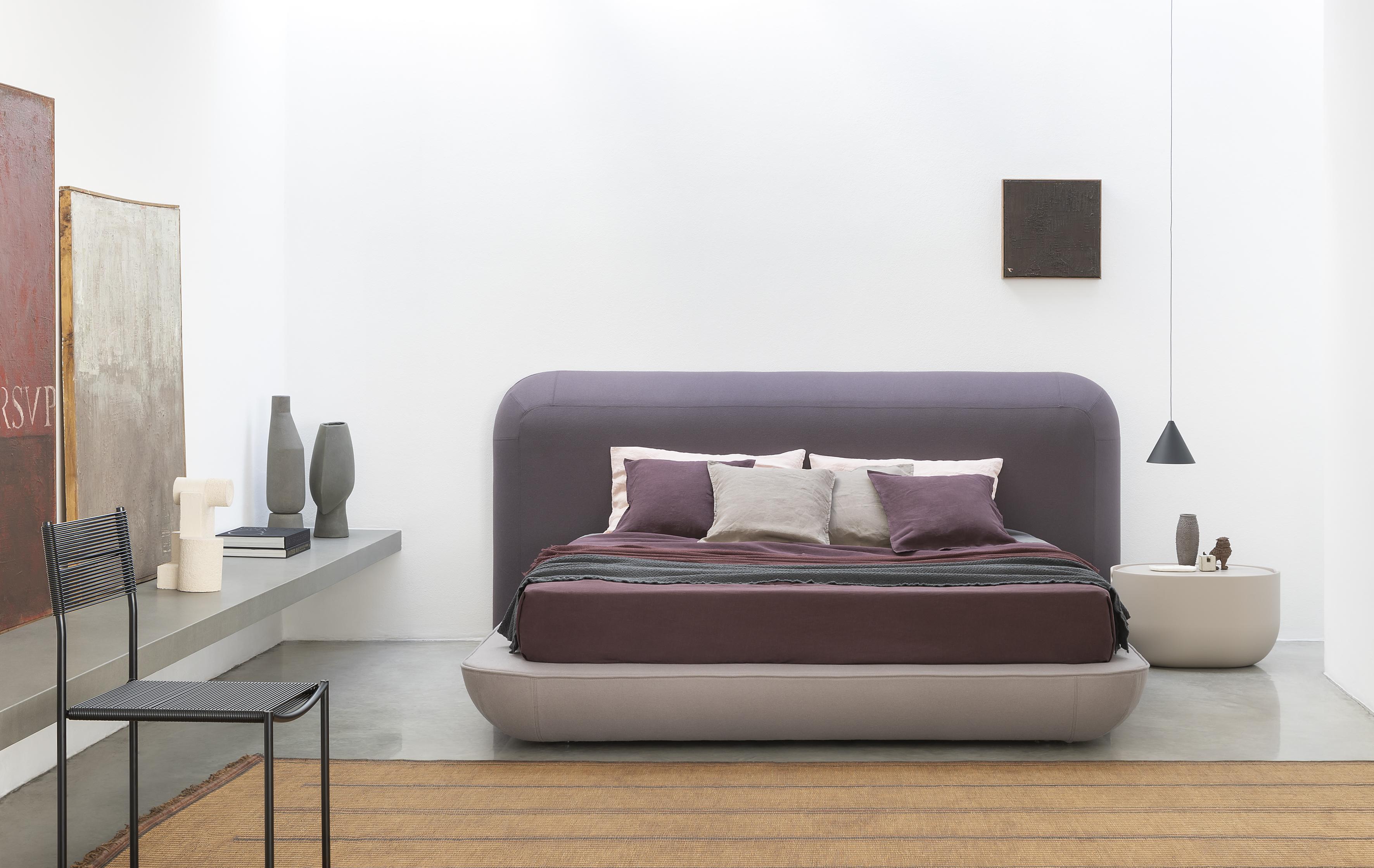 Alias 28A Large Okome Bed with Headboard Upholstered in White by Nendo

Bed with upholstered headbord and structure. Removable cover in eco leather Serge Ferrari®, Alias®, Camira® or Kvadrat® fabric or Pelle Frau® leather. Wooden staves. Mattress