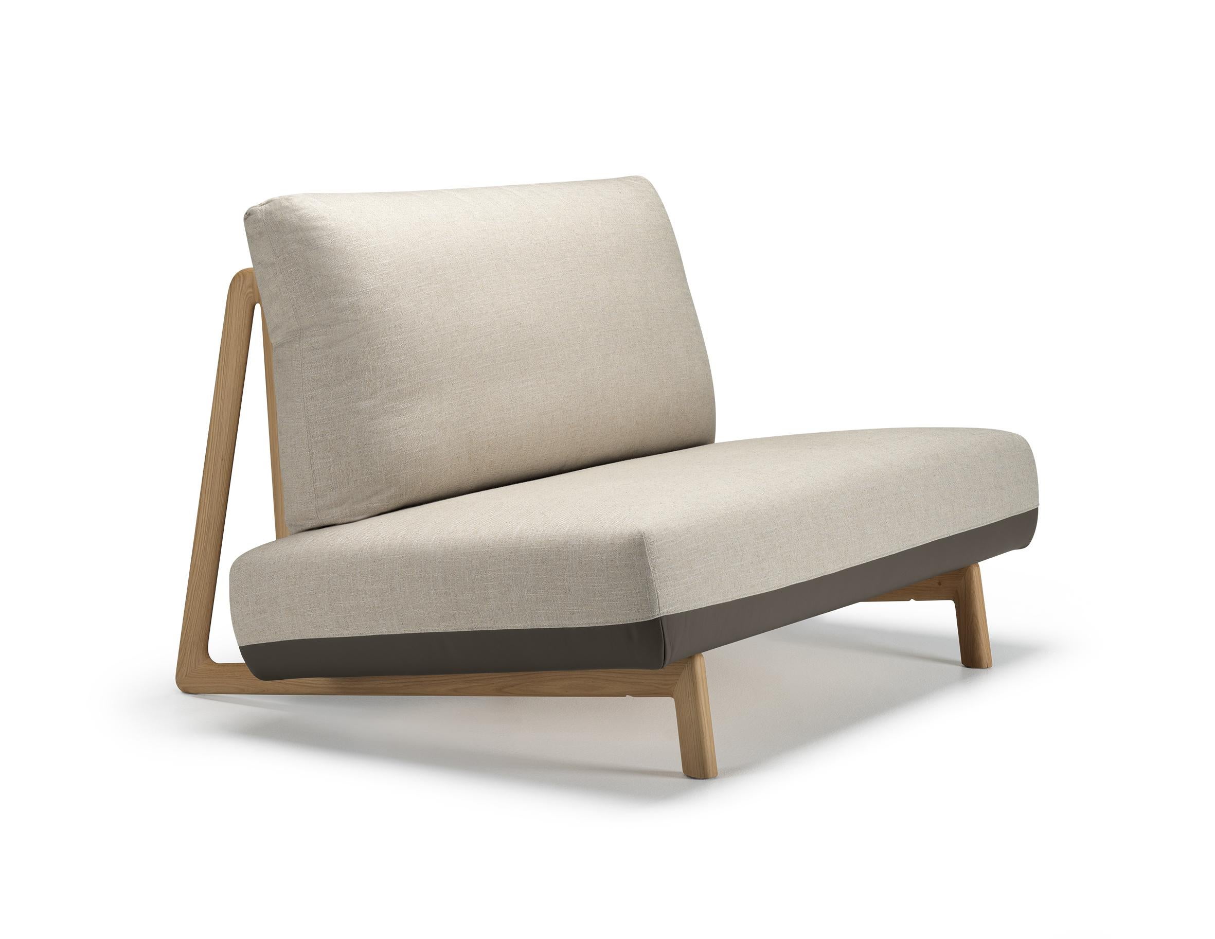 Alias D10 Trigono Armchair in Beige Upholstery with Natural Oak Frame by Michele De Lucch

Armchair with structure in solid oak andÂ belts in fabric or leather.Seat and back combined with removable cover in fabric or leather.NOTES: the seat has a