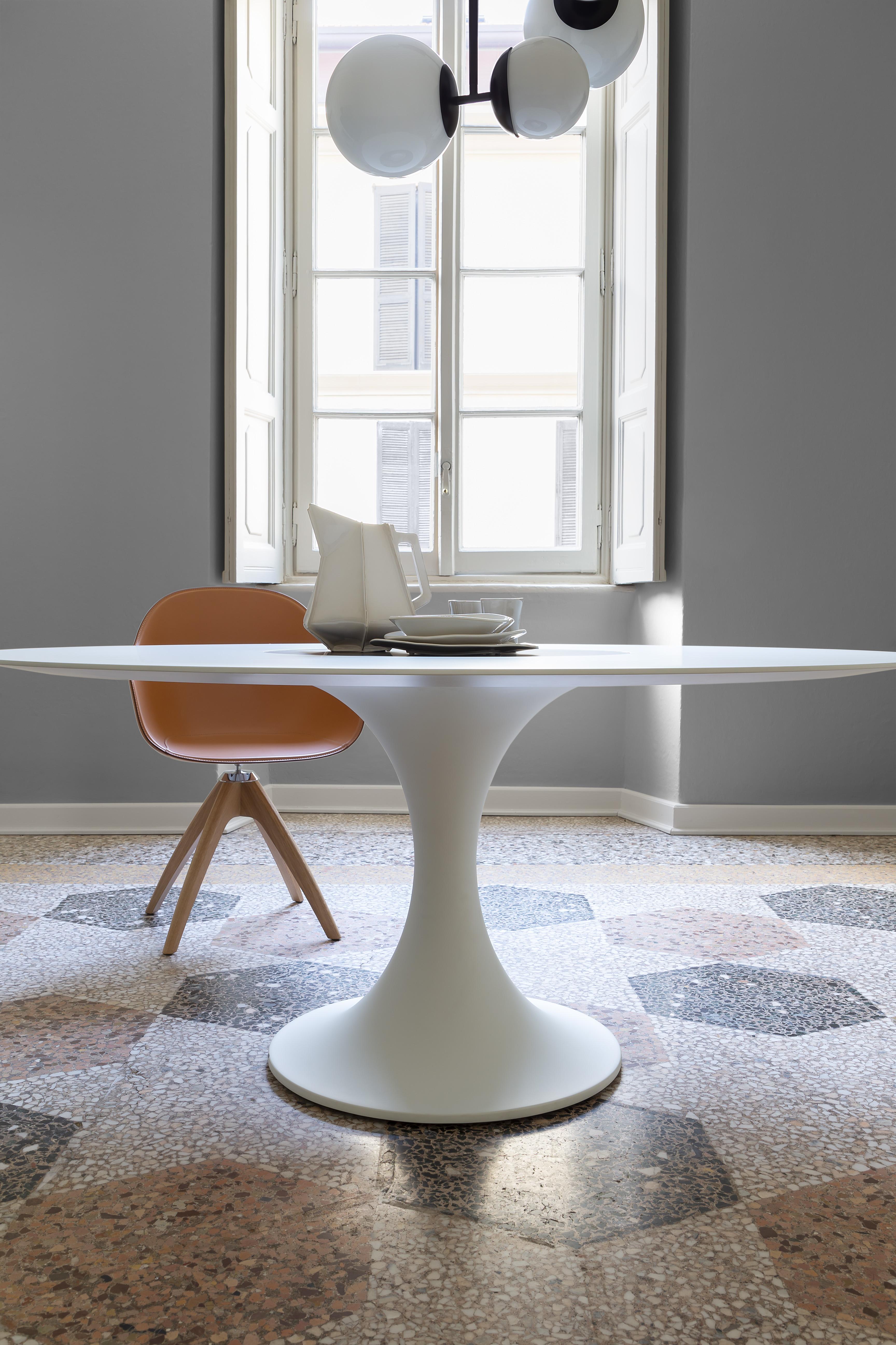 Alias Large 08C Manzù Turn Table in Carrara Marble Top and White Lacquered Framey Pio Manzù

Round table with base in lacquered plastic material (internal frame in steel). Top in lacquered MDF (*). Central turning plate Ø63 cm in:- lacquered