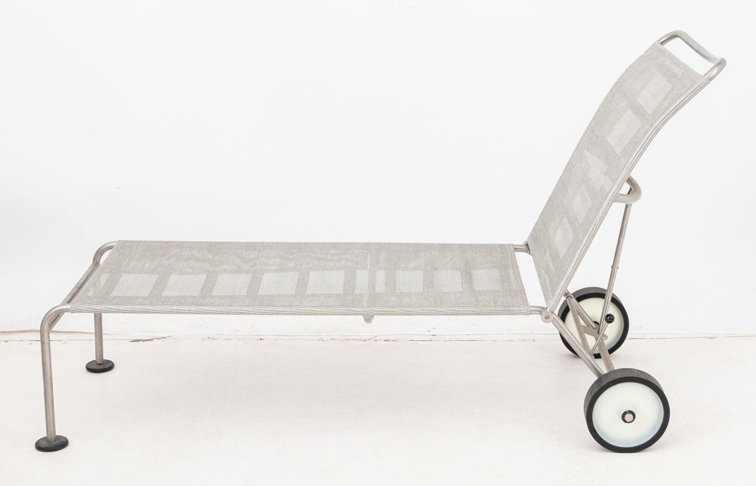 Alias Brushed Stainless Steel Outdoor Chaise Longue, with grey mesh seat and adjustable back atop casters, 