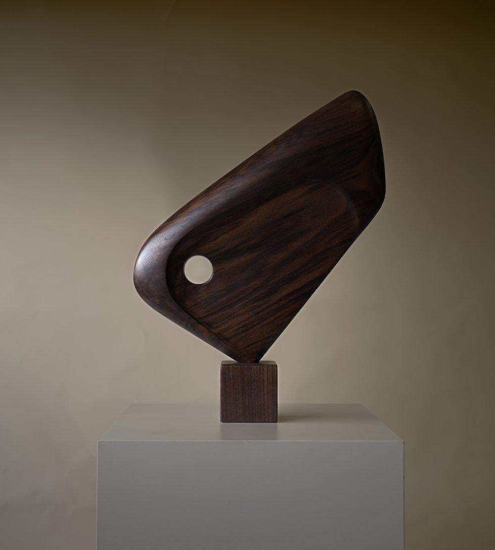 Alibeck Sculpture by Chandler McLellan
Limited Edition of 8 Pieces.
Dimensions: D 7.6 x W 45.7 x H 48.3 cm. 
Materials: Walnut.

Sculptures will be signed and numbered on the bottom of the base. Wood grain will vary, wood species will not. Please