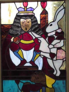 Alice in Wonderland, A Five Piece Suite of Stained and Leaded Glass Doors.