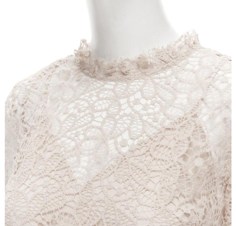 ALICE MCCALL Back To You nude lace bell flared sleeve mini dress US4  S
Reference: JECN/A00010
Brand: Alice McCall
Model: Lace dress
Material: Lace
Color: Beige
Pattern: Solid
Closure: Zip
Lining:  Polyester
Extra Details: Stand collar. Ruffle