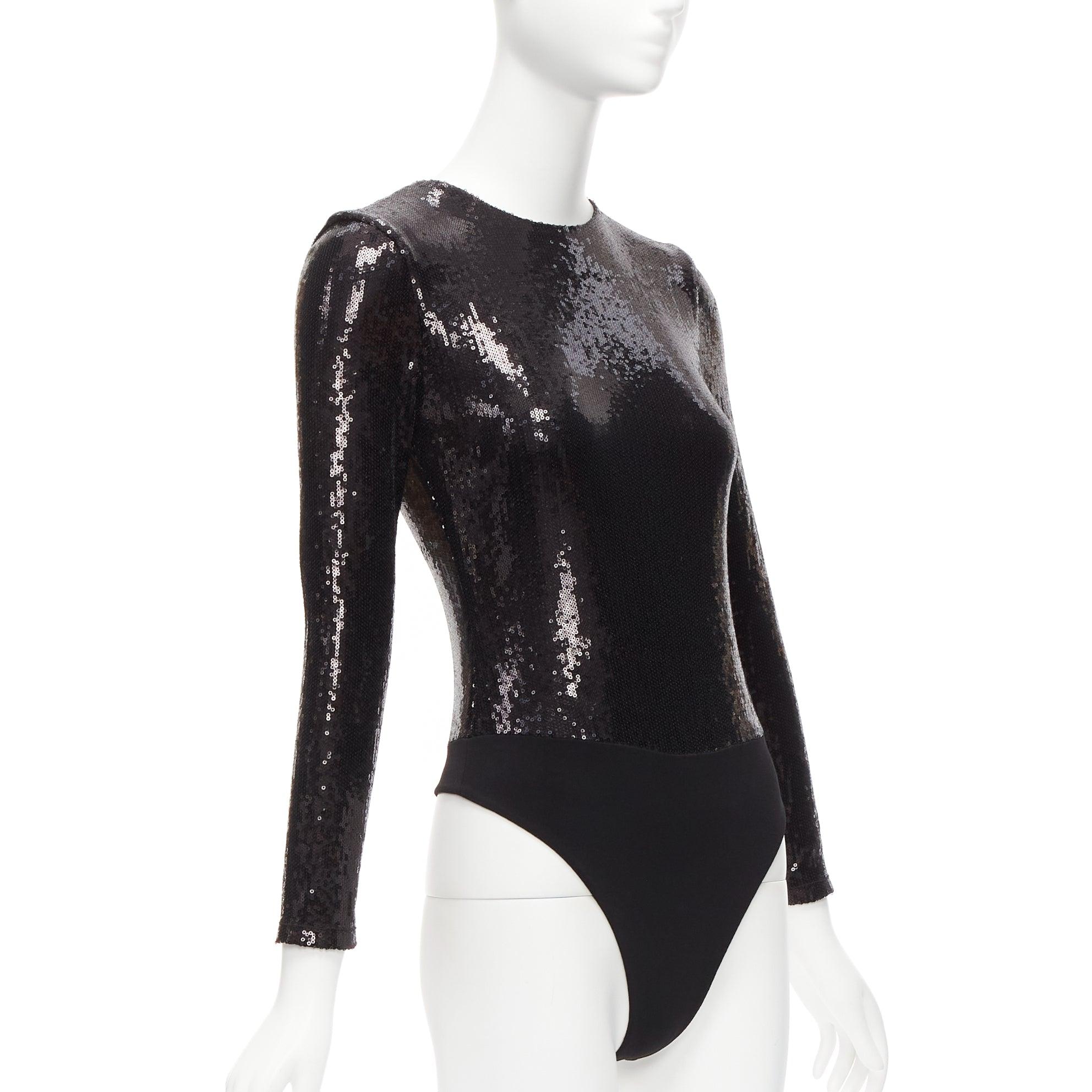 ALICE MCCALL black sequins long sleeve crew neck bodysuit top XS
Reference: AAWC/A00606
Brand: Alice McCall
Material: Viscose, Blend
Color: Black
Pattern: Solid
Closure: Zip
Lining: Black Fabric
Extra Details: Back zip. No button opening at