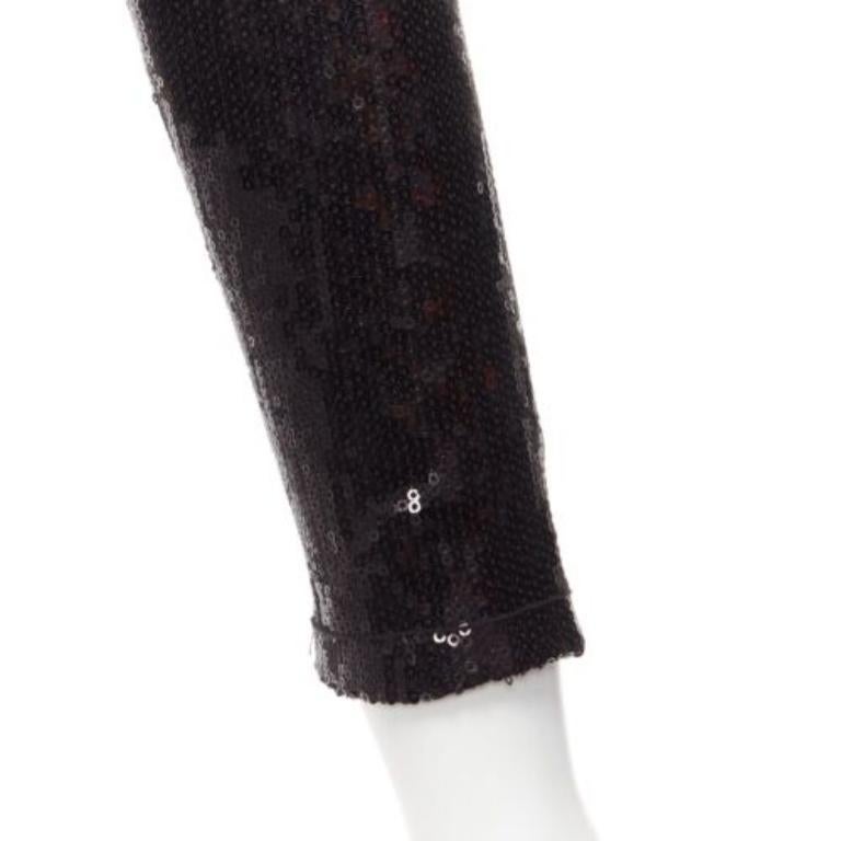ALICE MCCALL black sequins long sleeve crew neck bodysuit top XS
Reference: AAWC/A00606
Brand: Alice McCall
Material: Viscose, Blend
Color: Black
Pattern: Solid
Closure: Zip
Lining: Black Fabric
Extra Details: Back zip. No button opening at