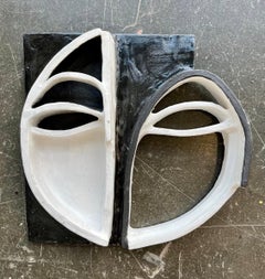 Mask 12, abstract black and white clay mask by Alice Mizrachi