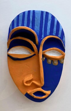 Mask 22, blue and orange clay mask by Alice Mizrachi