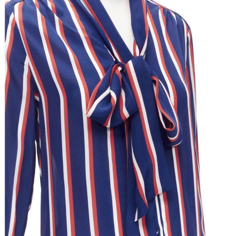 ALICE OLIVIA 100% silk blue red white striped pussybow blouse shirt XS
Reference: AAWC/A00261
Brand: Alice Olivia
Material: 100% Silk
Pattern: Striped
Closure: Button
Made in: China

CONDITION:
Condition: Excellent, this item was pre-owned and is in
