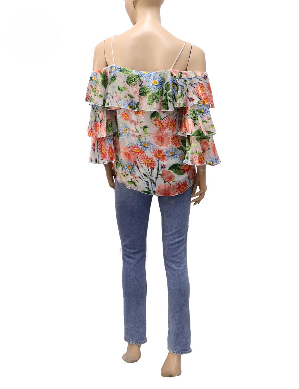 Alice + Olivia Allover Floral Print Cold Shoulder Ruched Ruffle Trim Top.

Material:  65% Viscose, 35% Silk; Lining 94% Polyester, 6% Elastane; Combo 100% Silk
Size: EU 36 / S
Condition Overall: New
