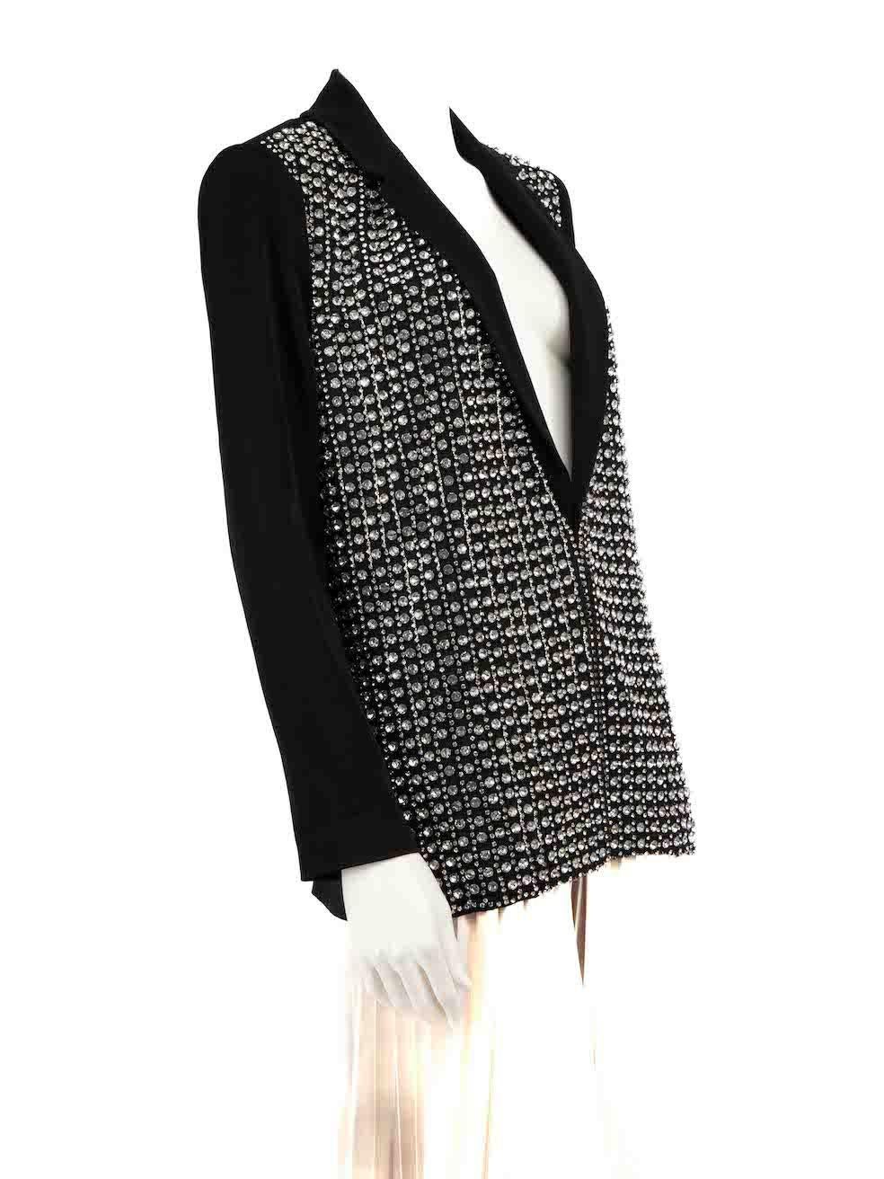 CONDITION is Very good. Minimal wear to jacket is evident. Minimal plucks to overall material especially on the sleeves and rear shoulder on this used Alice + Olivia designer resale item.
 
 
 
 Details
 
 
 Black
 
 Synthetic
 
 Blazer
 
 Crystal