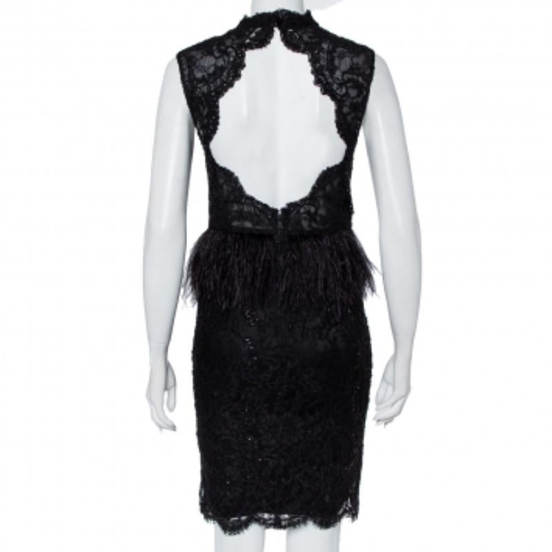 This dress from Alice + Olivia has been designed to deliver sophistication and class. It comes in a shade of black and features a well-tailored silhouette. This lace dress comes in a peplum style with feather trims on the waistline and a beautiful