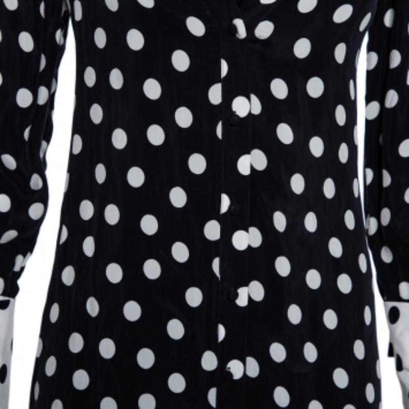 A fashionable Alice + Olivia dress like this is excellent for any season. Your casual repertoire can be complete with the addition of this cool black dress. It carries a shirt-like silhouette with long sleeves and has polka dots all over.