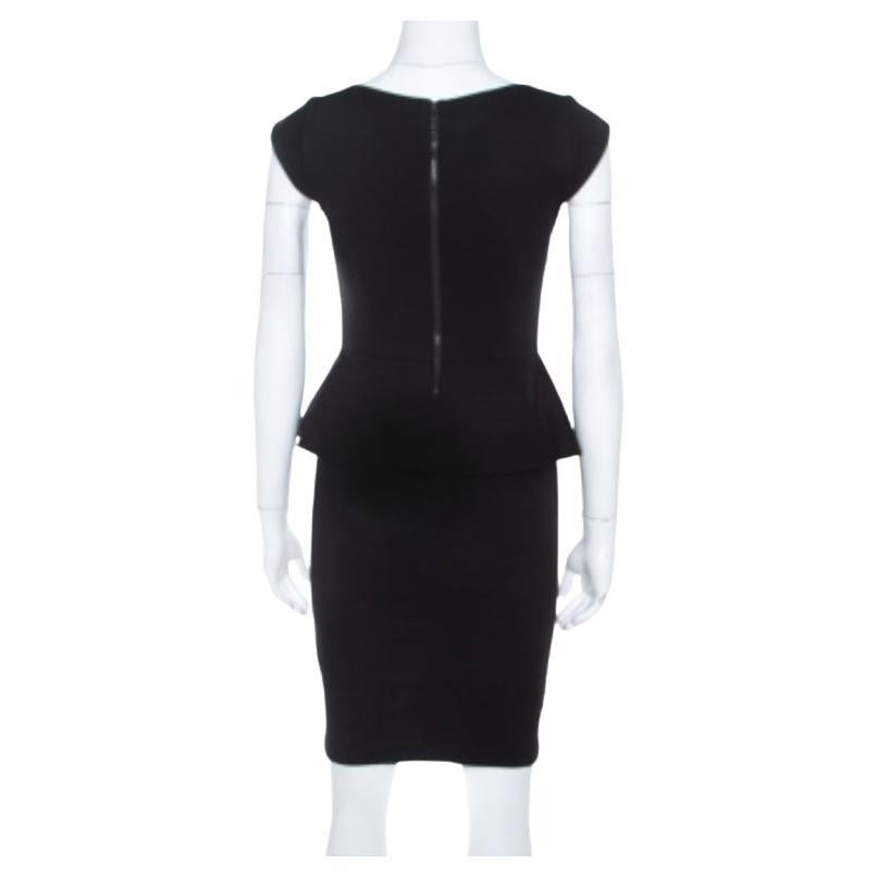 An elegant and urbane piece like this Alice + Olivia one deserves a special place in your wardrobe. This black dress, with peplum detail, is the perfect pick that oozes out utmost grace. It can be paired with pumps or sandals.