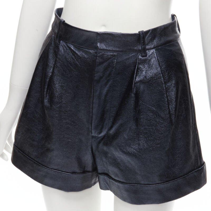 ALICE OLIVIA blue metallic faux leather cuffed high waisted shorts US0 XS
Reference: AAWC/A00309
Brand: Alice Olivia
Material: Faux Leather
Color: Navy
Pattern: Solid
Closure: Zip Fly
Lining:  Fabric
Made in: Vietnam

CONDITION:
Condition: