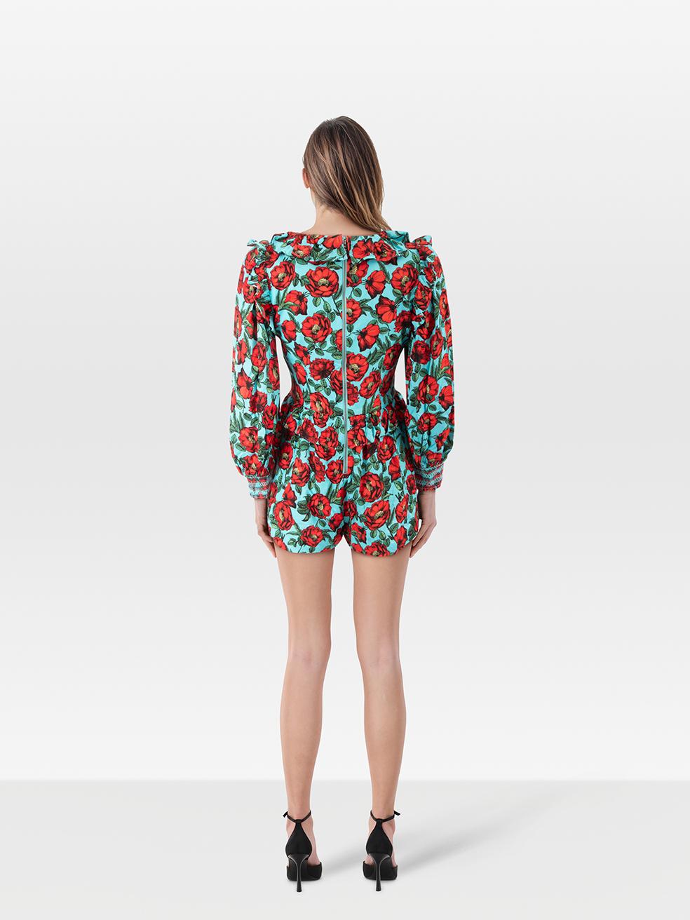 CONDITION is Very Good. Hardly any visible wear to the playsuit is evident on this used Alice + Olivia designer resale item.
 
 Details
 
 
 Blue & Red
 
 Viscose
 
 Playsuit
 
 Long sleeves
 
 Floral print
 
 Ruffle trim
 
 Back zip fastening
 
 
