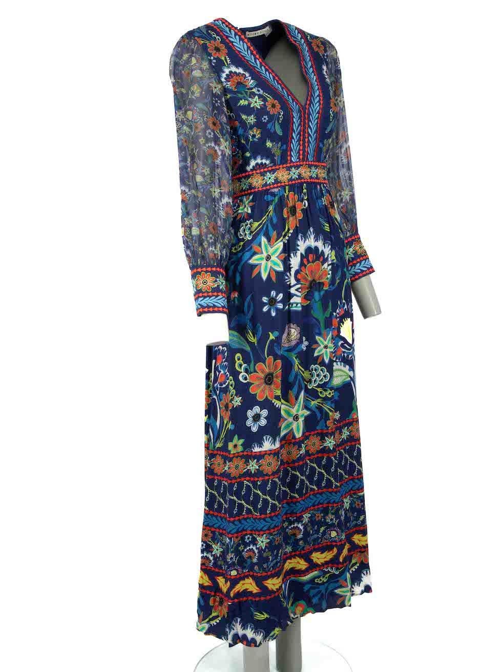 CONDITION is Very good. Minimal wear to dress is evident. Minimal pull to thread to rear skirt on this used Alice + Olivia designer resale item.
 
Details
Multicolour
Viscose
Maxi dress
Floral pattern
Sheer sleeves
V neckline 
Embroidered accent