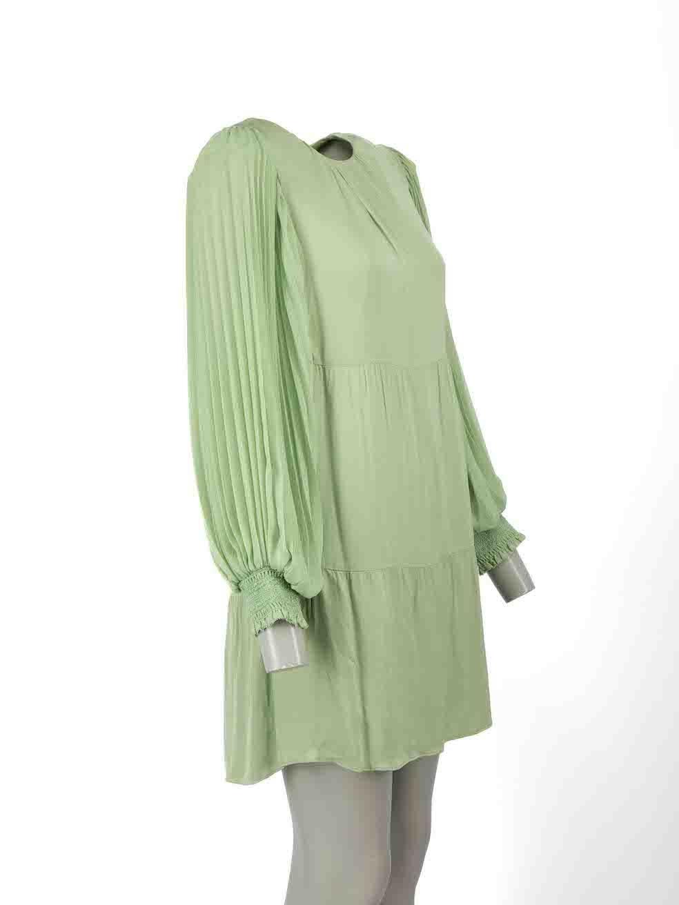 CONDITION is Never worn, with tags. No visible wear to dress is evident on this new Alice + Olivia designer resale item.
 
Details
Green
Viscose
Dress
Long puff sleeves
Mini
Round neck
Back zip and hook fastening

Made in China
 
Composition
100%