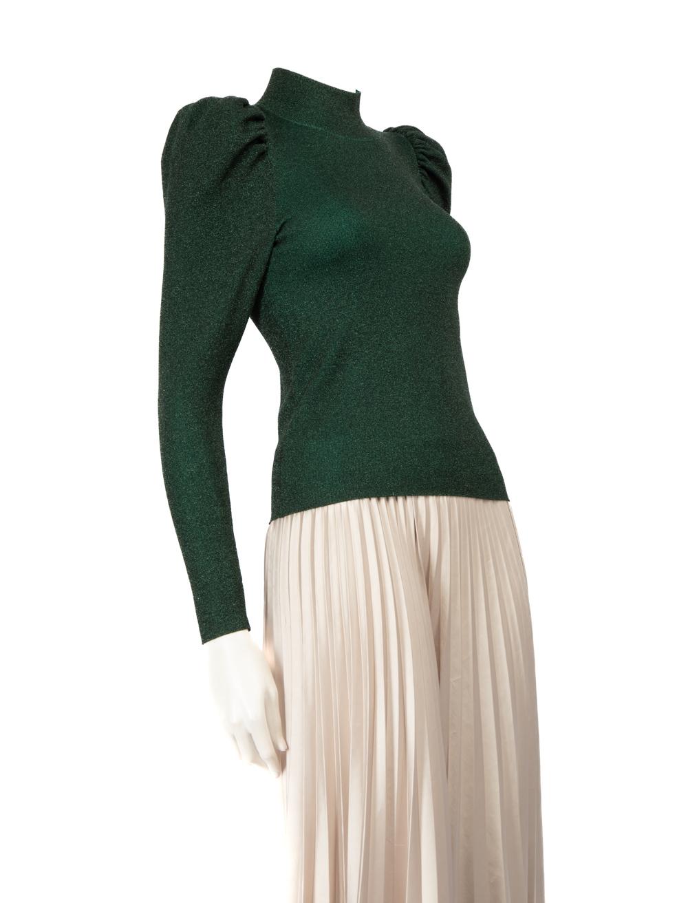 CONDITION is Very good. Minimal wear to the top is evident. Light pilling under the left armpit of this used Alice + Olivia designer resale item.
 
 
 
 Details
 
 
 Green
 
 Wool
 
 Knit top
 
 Metallic thread
 
 Long sleeves
 
 Turtleneck
 
