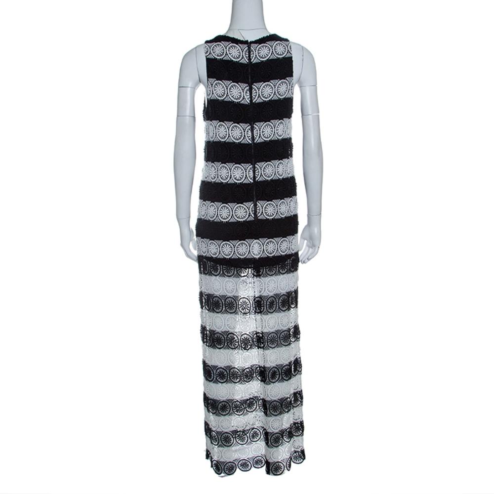 Presented by the house of Alice+Olivia, this maxi dress is a stylish wardrobe upgrade for a look glamourous panache. Characterized by chic monochrome stripes over a crochet lace overlay, this sleeveless dress is a chic choice for a runway-worthy