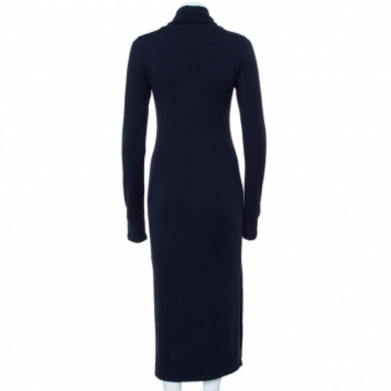 This dress is a flawless example of Alice + Olivia's ingenious style put together with up-to-date fashion. This navy blue maxi dress is a comfortable piece for work, brunches, or a regular day out. The dress, complete with a side slit, is an