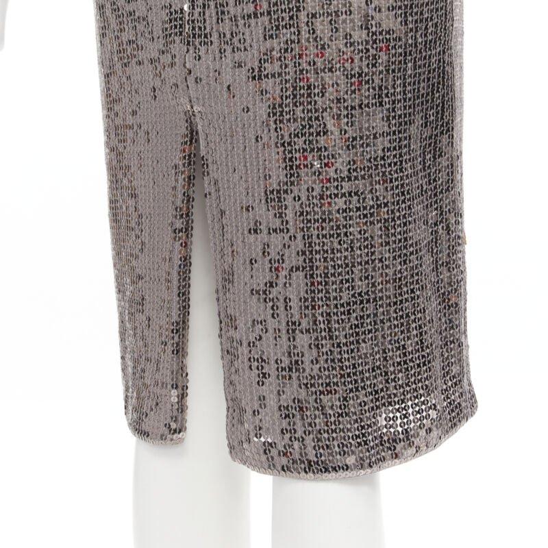 ALICE OLIVIA silver metallic sequins back slit knee length pencil skirt US0 XS
Reference: AAWC/A00322
Brand: Alice Olivia
Material: Polyester, Blend
Color: Silver
Pattern: Solid
Closure: Zip
Lining:  Fabric
Extra Details: Back zip detail.
Made in: