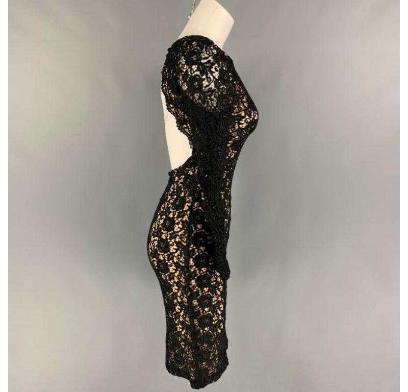 ALICE + OLIVIA dress comes in a black & beige lace viscose blend featuring a open back, long sleeves, single button, back slit, and a back zip up closure.Very Good
Pre-Owned Condition. 

Marked:   0 

Measurements: 
 
Shoulder: 14 inches  Bust: 29