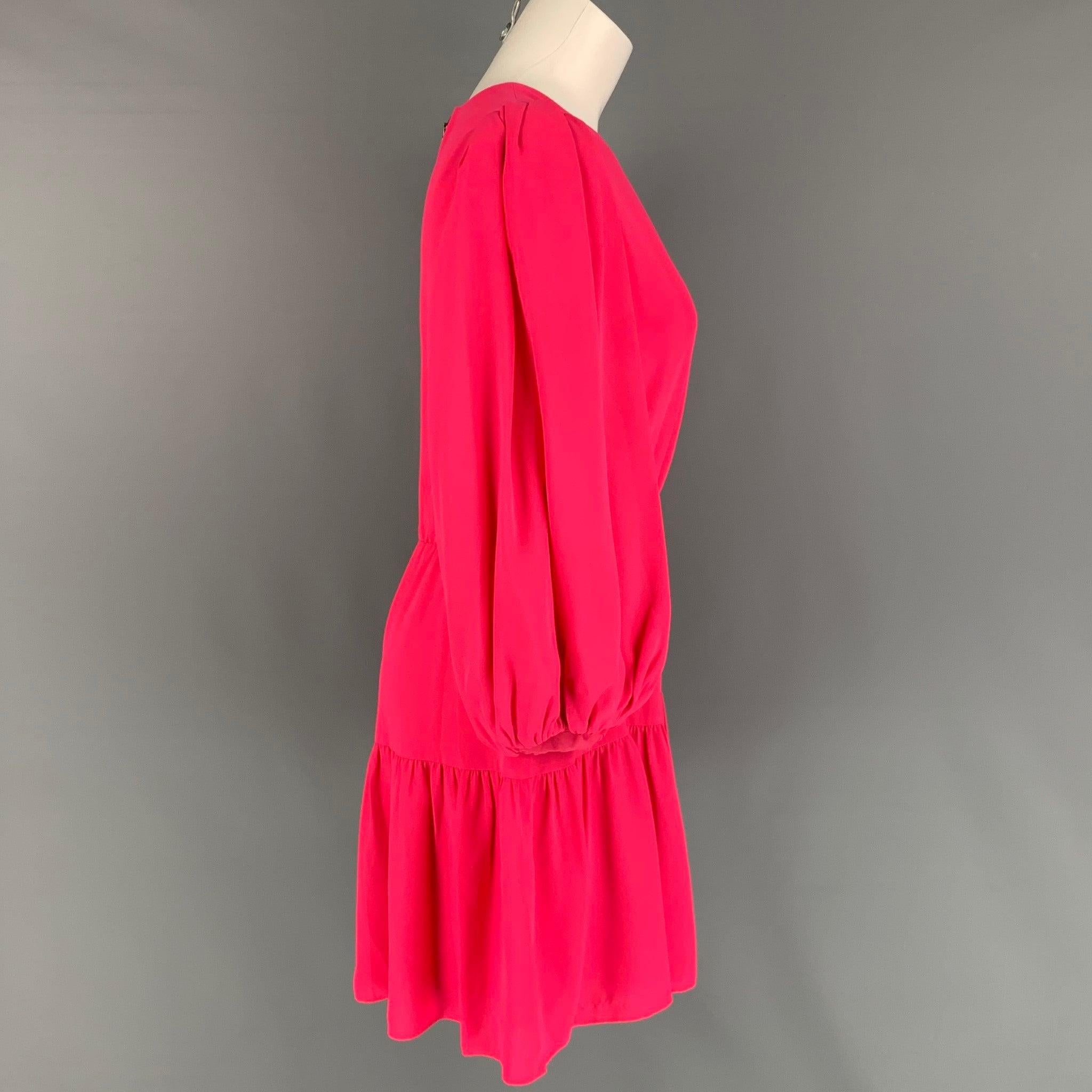 ALICE + OLIVIA dress comes in a pink polyester / lurex featuring an a-line style, balloon sleeves, pleated, elastic waistband detail, and a back zip up closure.
 Very Good
 Pre-Owned Condition. 
 

 Marked:  10 
 

 Measurements: 
  
 Shoulder: 13.5