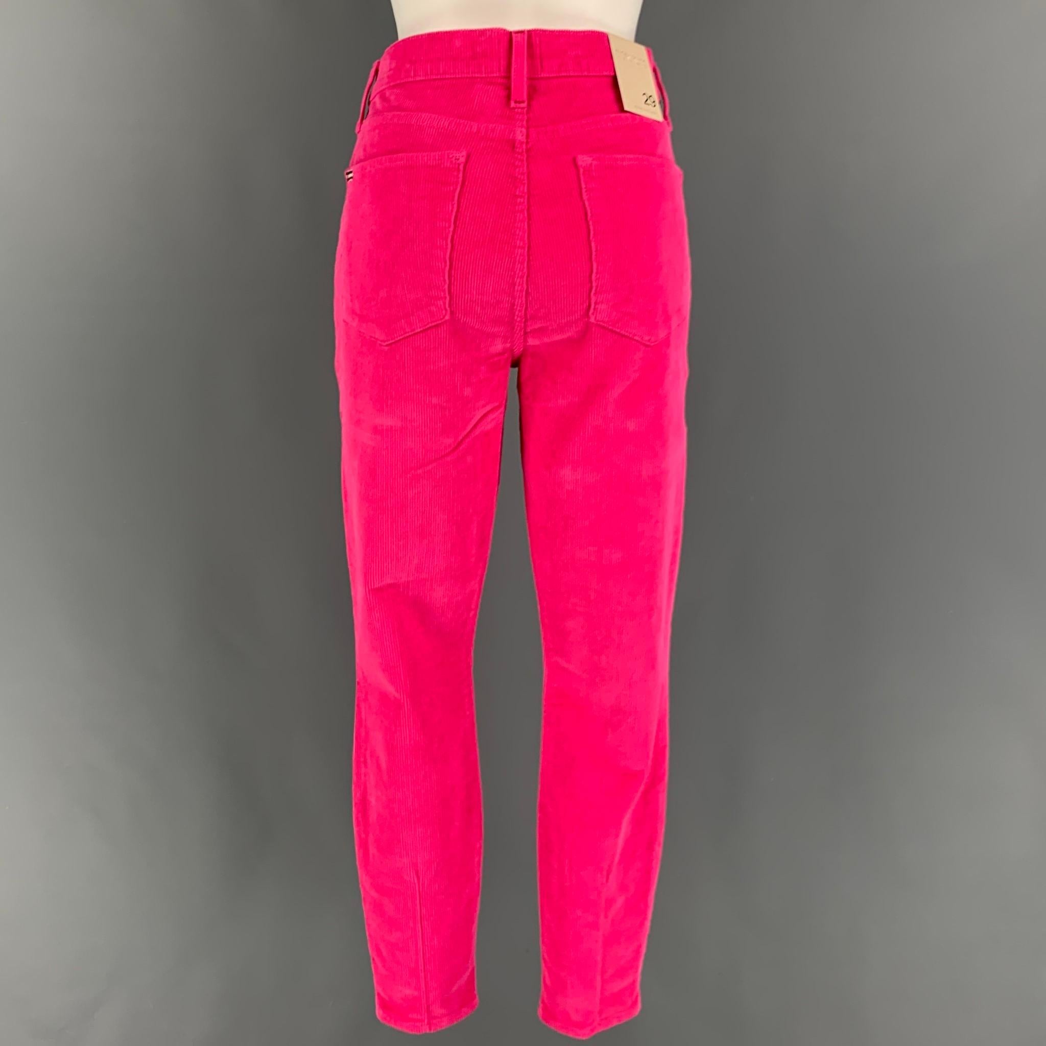 ALICE + OLIVIA casual pants comes in a pink cotton corduroy featuring a jean cut, skinny fit, and a zip fly closure. Made in USA.

New With Tags. 
Marked: 29
Original Retail Price: $225.00

Measurements:

Waist: 29 in.
Rise: 11 in.
Inseam: 27 in. 