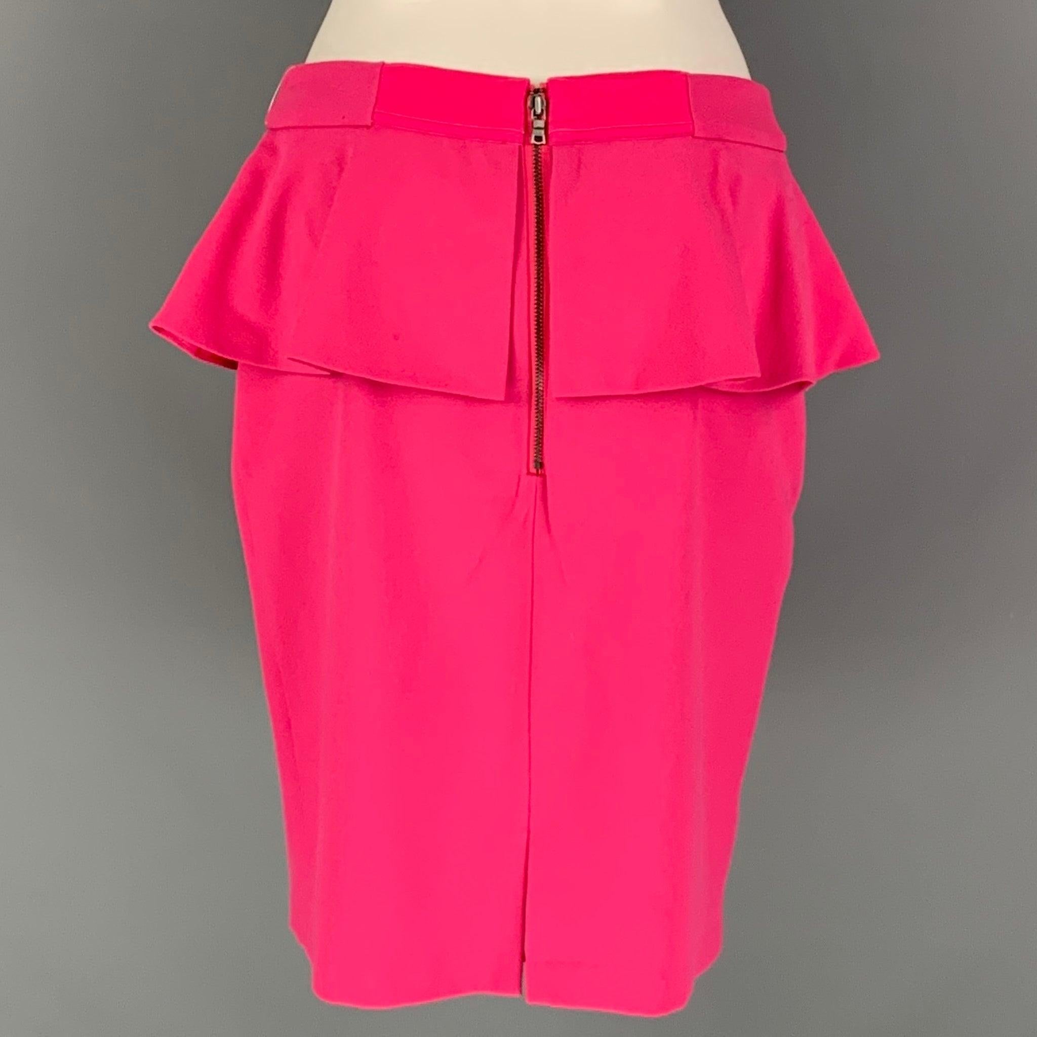 ALICE + OLIVIA skirt comes in a pink polyester blend knit material featuring peplum style, and zip up closure at center back.Excellent Pre-Owned Condition. 

Marked:   6 

Measurements: 
  Waist: 30 inHip: 39 inches Length: 20 inches 
 
 
  
  
