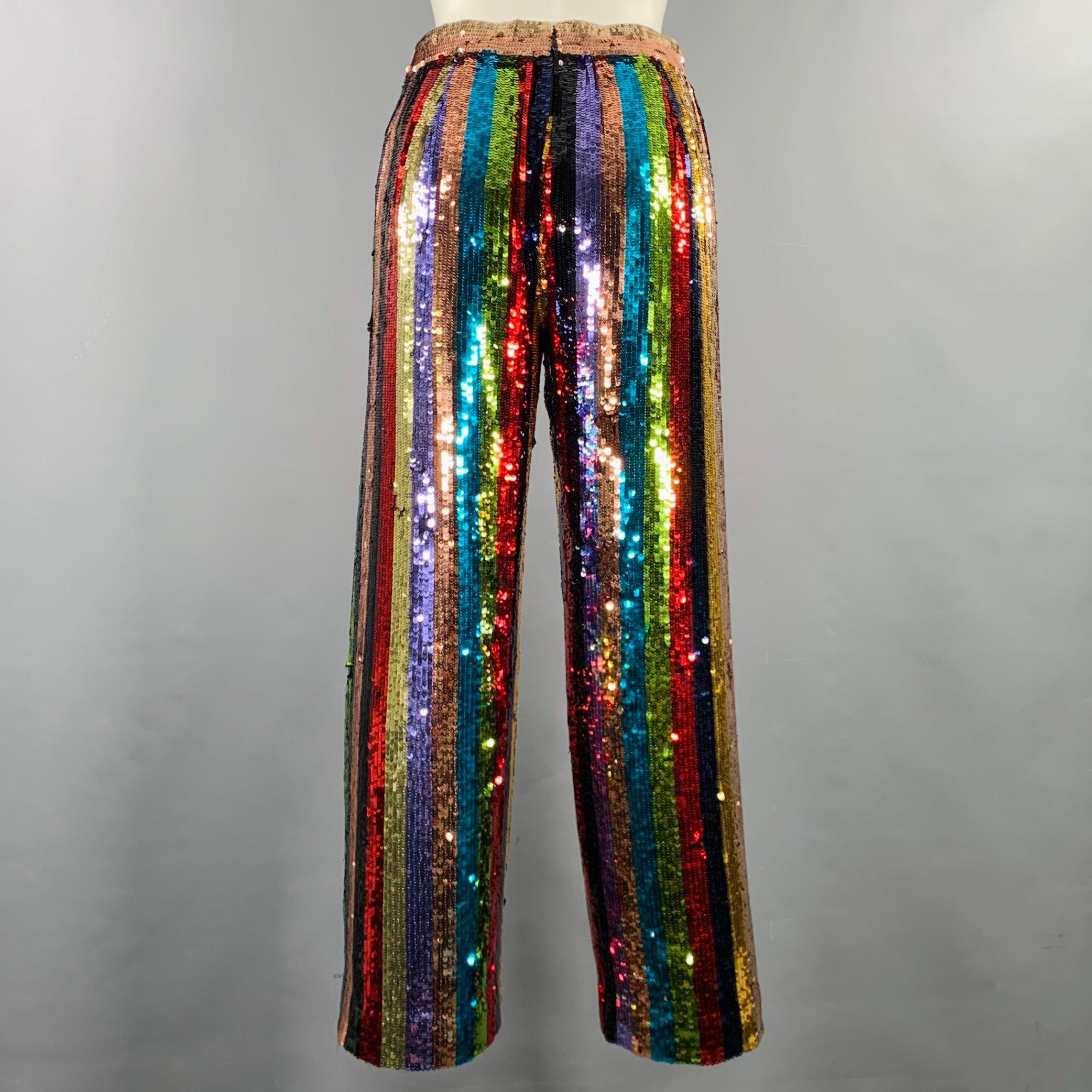 ALICE + OLIVIA dress pants
in a multi-color polyester featuring an all over sequined design with stripe pattern, wide leg, and back zipper closure.Very Good Pre-Owned Condition. Very minor signs of wear. 

Marked:   XS 

Measurements: 
  Waist: 26