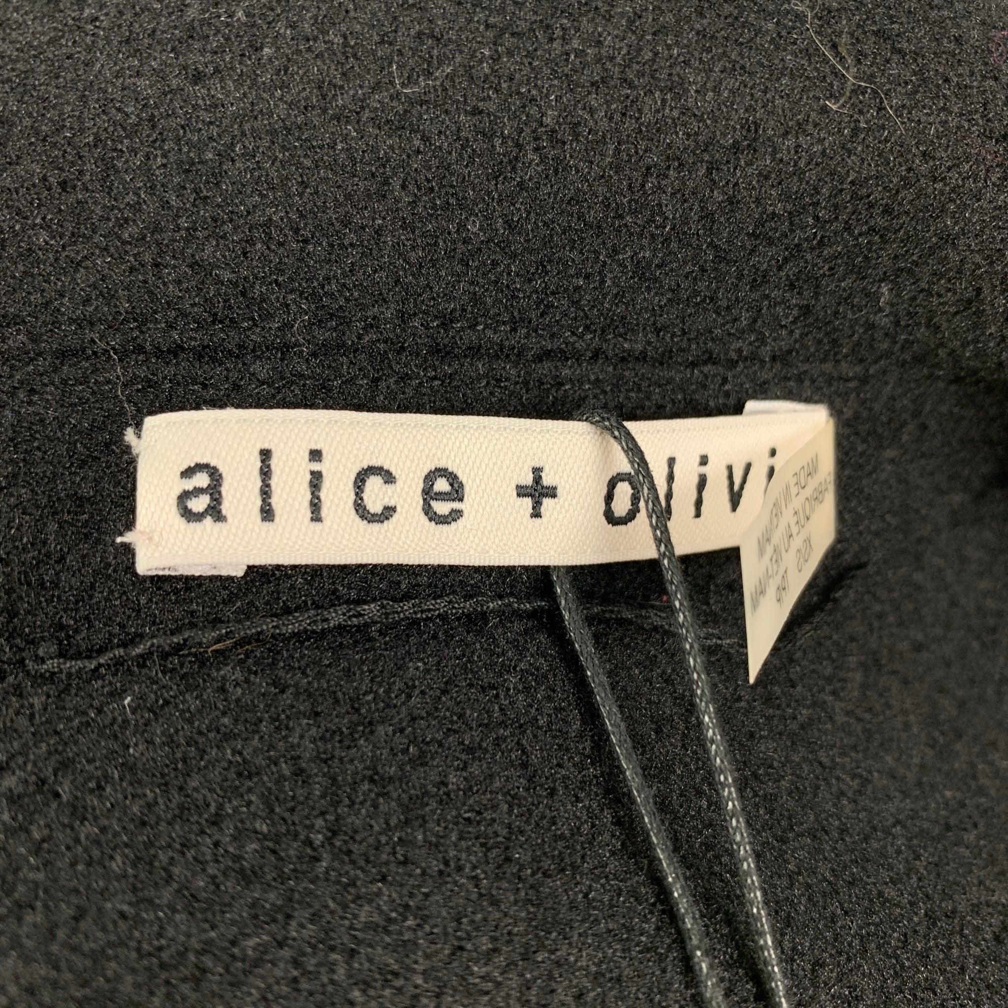 ALICE + OLIVIA Cappotto reversibile in poliestere con stampa animale bianco e nero taglia XS/S in vendita 1