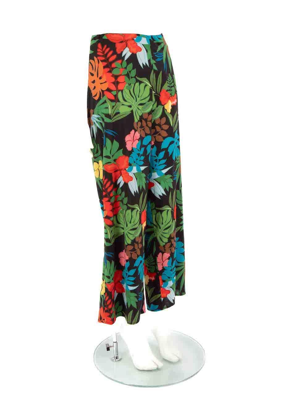 CONDITION is Very good. Hardly any visible wear to trousers is evident. However, the composition label is missing on this used Alice + Olivia designer resale item.



Details


Multicolour

Synthetic

Trousers

Tropical print

Wide leg

Elasticated
