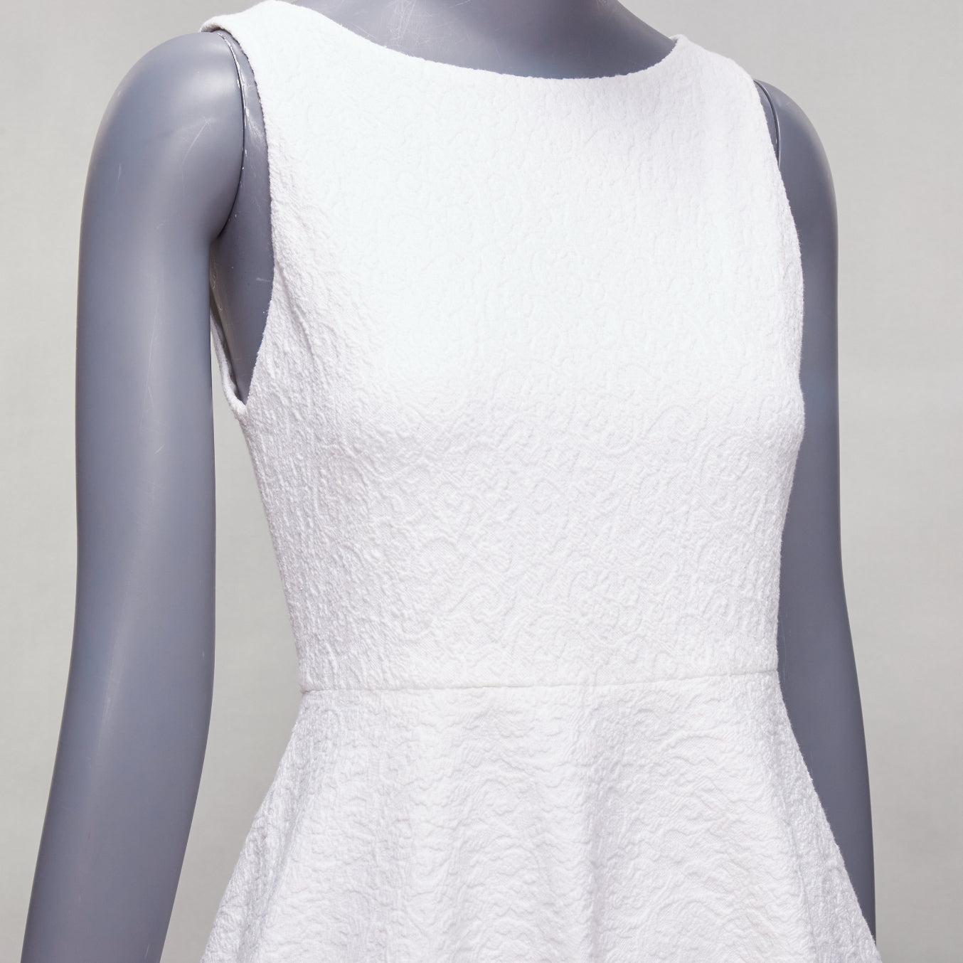 ALICE OLIVIA white cotton blend baroque jacquard fit flared dress US2 S
Reference: LACG/A00382
Brand: Alice Olivia
Material: Cotton, Blend
Color: White
Pattern: Barocco
Closure: Zip
Lining: White Fabric
Extra Details: Back zip.
Made in: