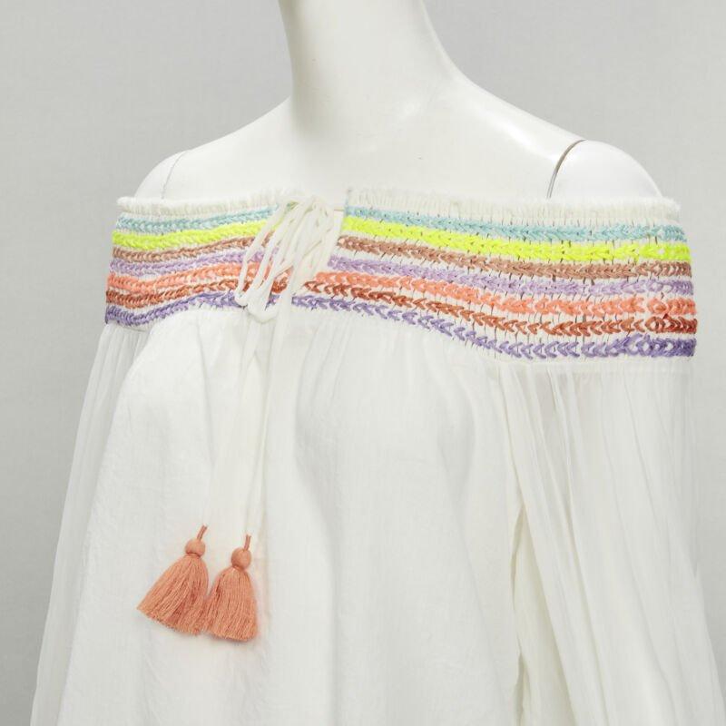 ALICE OLIVIA white cotton neon braid embroidery off shoulder top S
Reference: KNLM/A00003
Brand: Alice Olivia
Material: Cotton
Color: White
Pattern: Solid
Extra Details: Stretchy off shoulder band. Embroidery detailing on shoulder band and cuff.