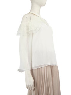 Alice + Olivia Top blanco con hombros recortados Talla M