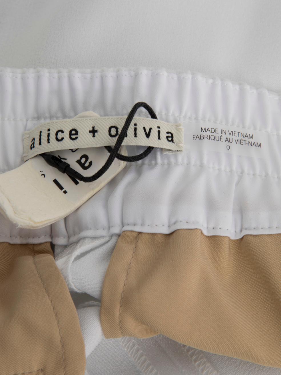 Alice + Olivia Pantalones blancos rectos con dobladillo dividido Talla XXS en Nuevo estado para la venta en London, GB