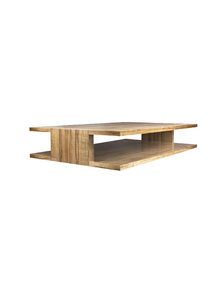 Alie low table y LK Edition
Dimensions: 220 x 14 x H 38 cm 
Materials: Exotic wood with a glossy varnish. 

It is with the sense of detail and requirement, this research of the exception by the selection of noble materials and his culture of the