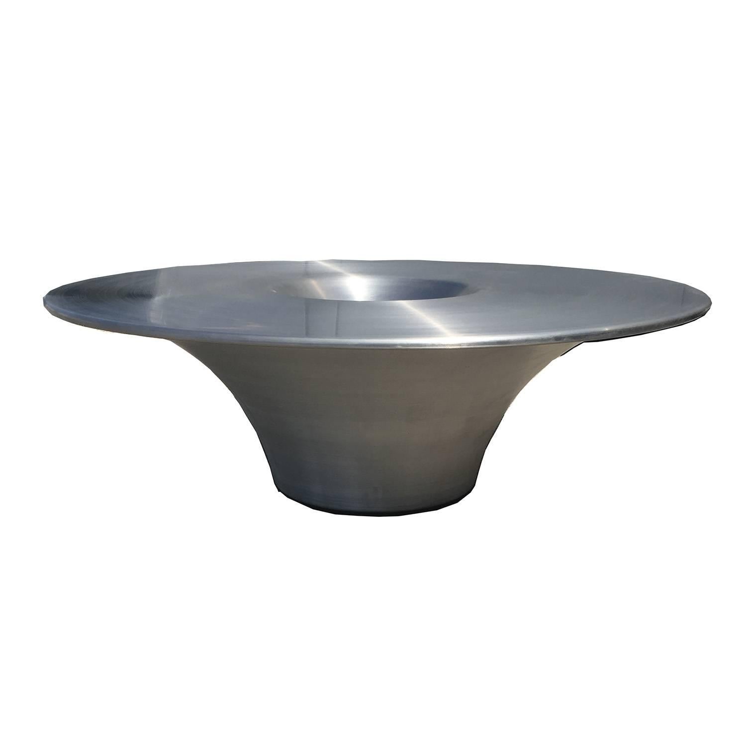 RETIREMENT SALE!!!  EVERYTHING MUST GO - CHECK OUT OUR OTHER ITEMS.

Created in the 1990s, this marvellous table references alien space craft with its' futuristic design. Of special note is the inset centre, as a catch all functional centre or chips