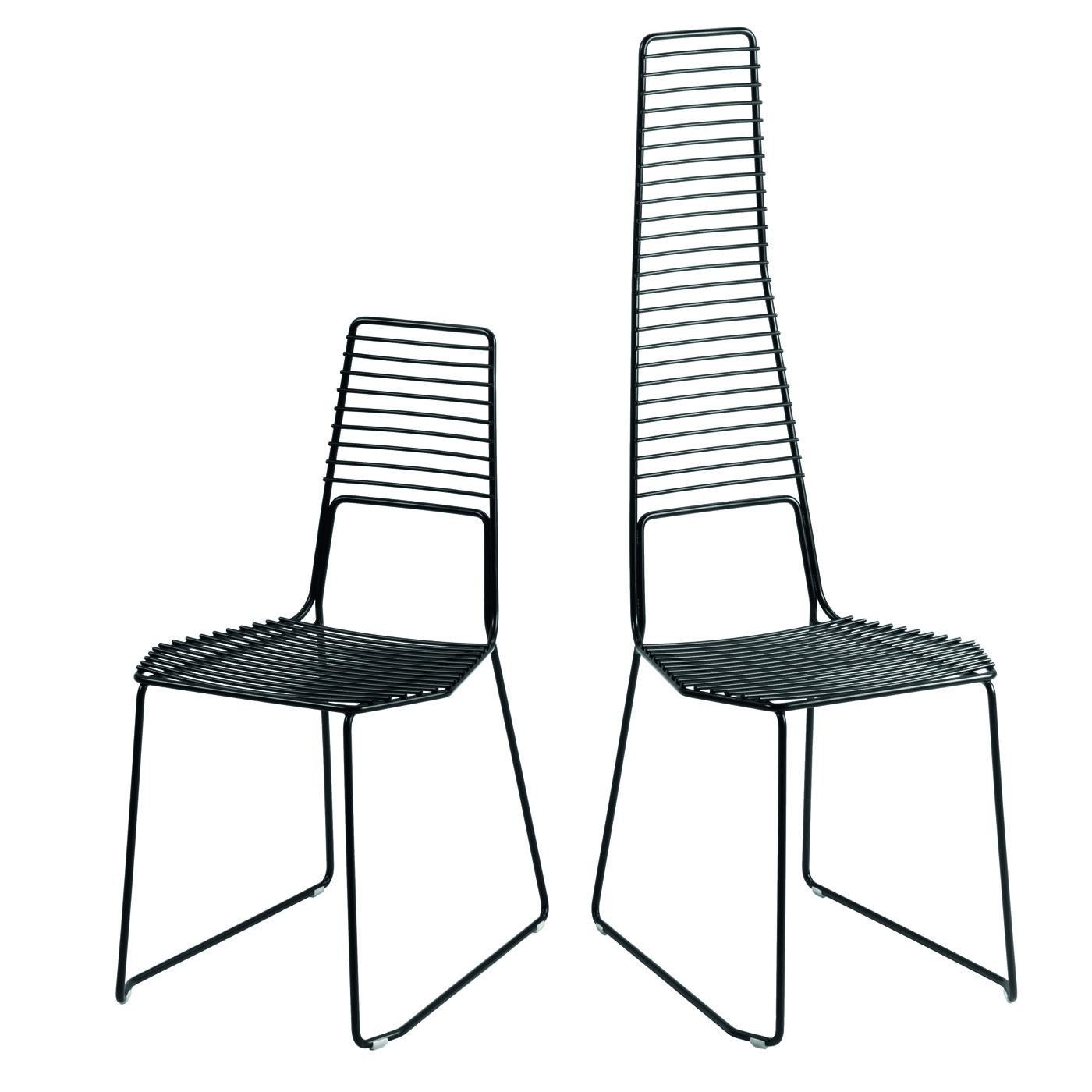 Part of the Alieno series designed by GamFratesi for Casamania, this set includes two chairs in embossed black-painted metal suitable for indoor and outdoor use. The simple shape plays with geometry to form an eye-catching silhouette with a strong