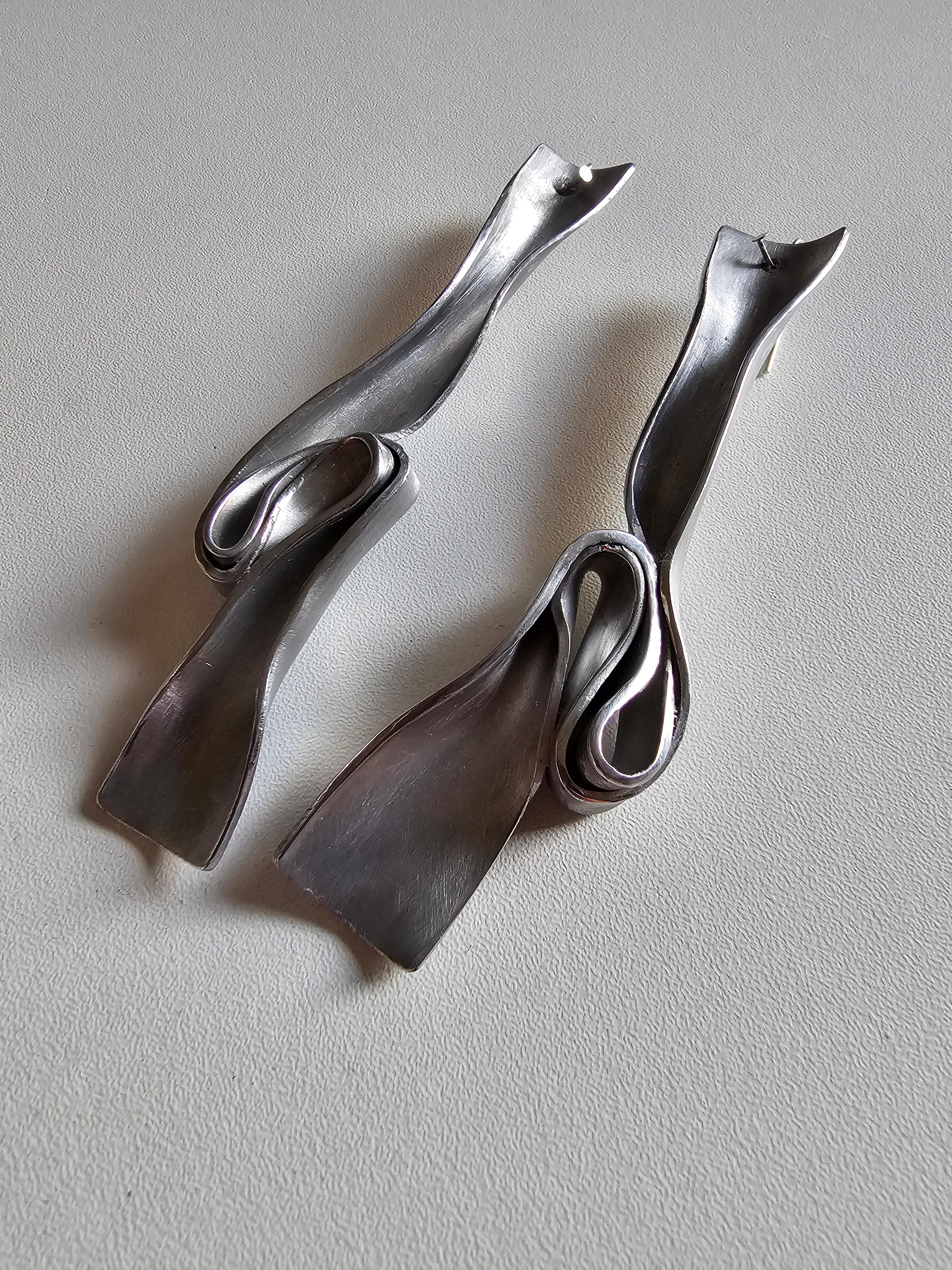 Long Comma Sculpture Statement Earrings in satinated aluminium and polished outlines 

From the 