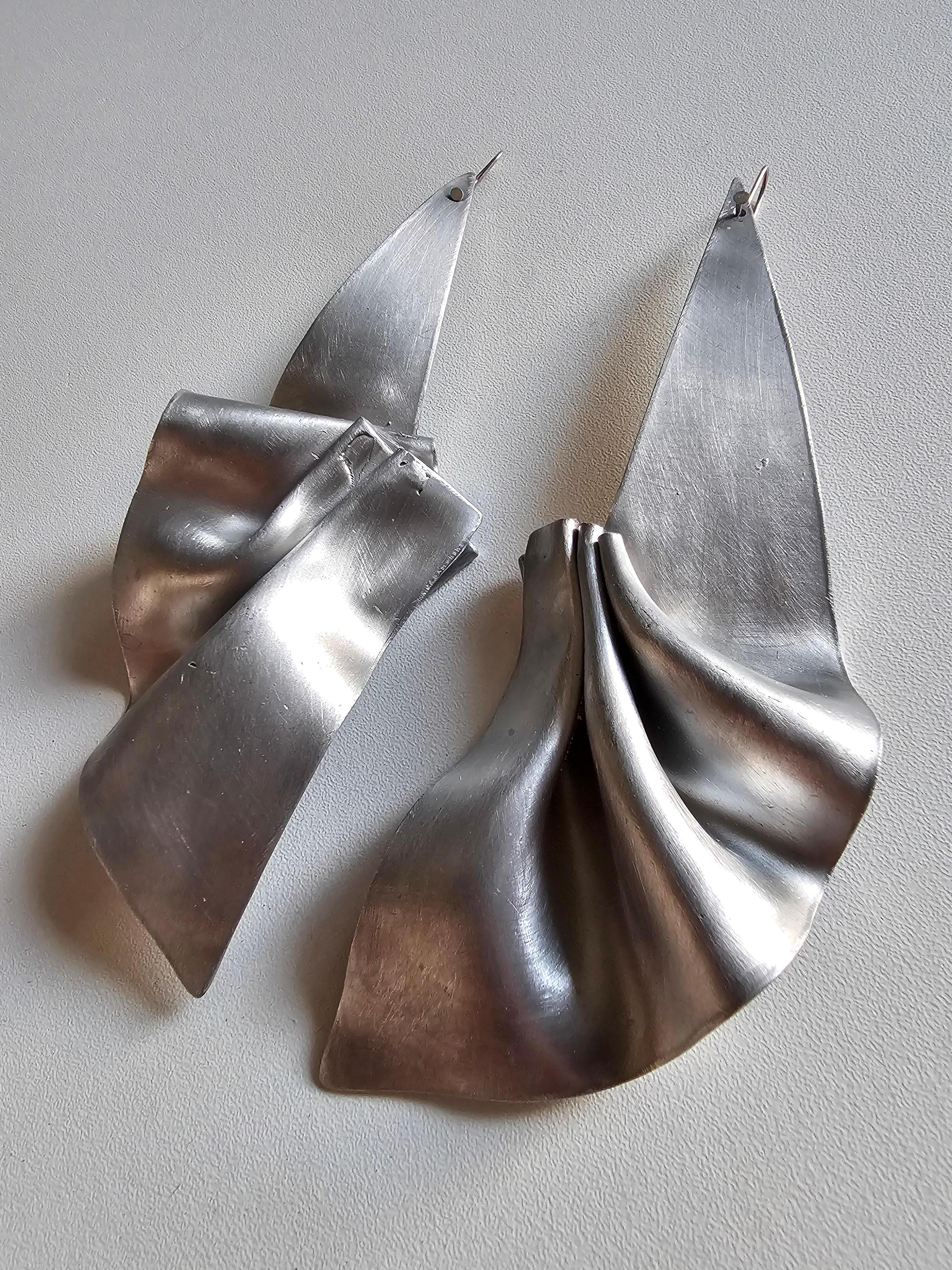 Long Pleats Sculpture Statement Earrings in satinated aluminium and polished outlines 

From the 