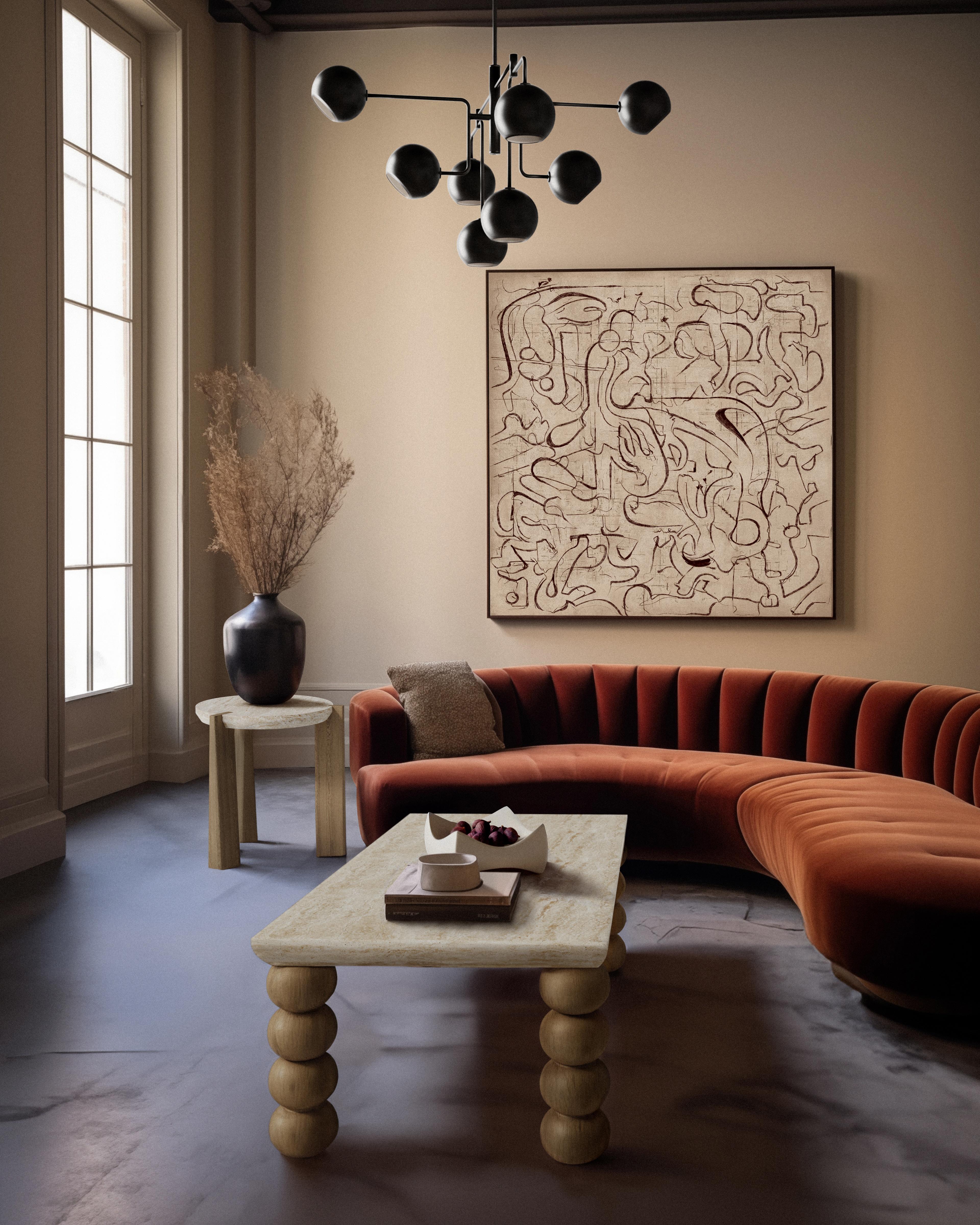 The Aline side table is a unique 3-legged accent table that combines solid Oak legs with a thick travertine top, creating a gorgeous and functional piece for any room. The exposed joinery of the legs and top highlights the superior craftsmanship and